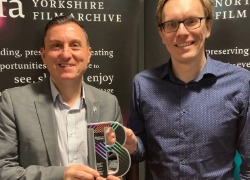 Pictured with the film's latest award are Graham Relton, Co-Director, Head of Access, Yorkshire and North East Film Archive, with Dr Ben Lamb