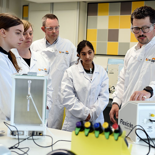 Training session with staff and students in the laboratories