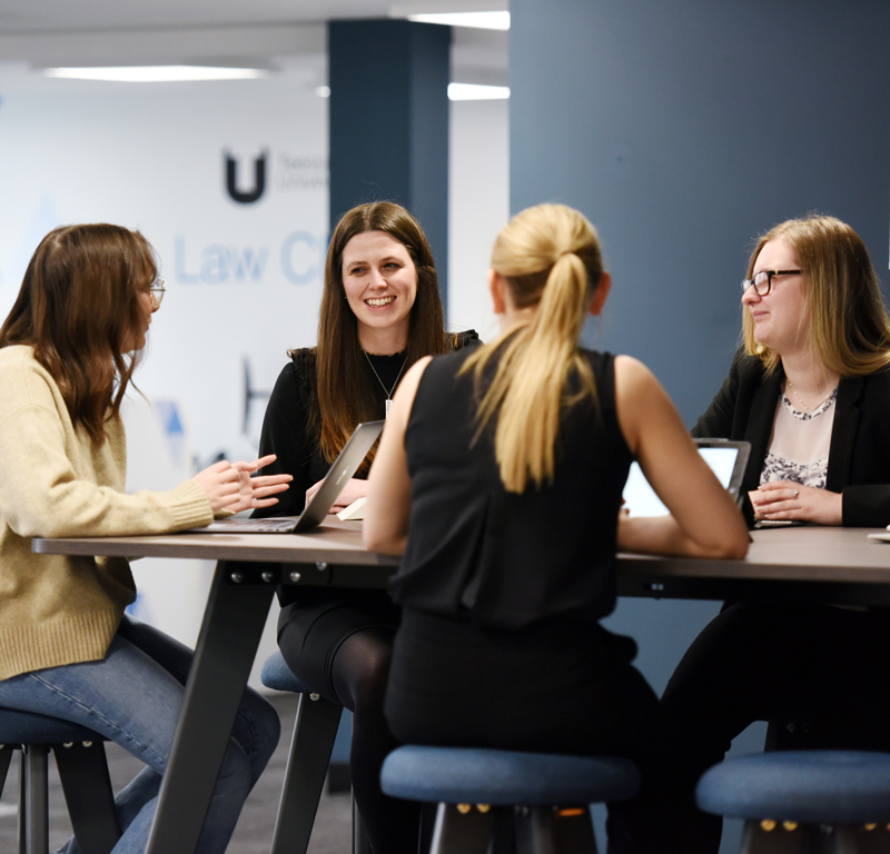 Some students having a meeting in Law building