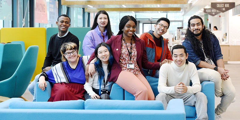 Teesside University International students sit toguether
