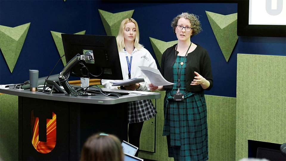 Staff discussion at Event