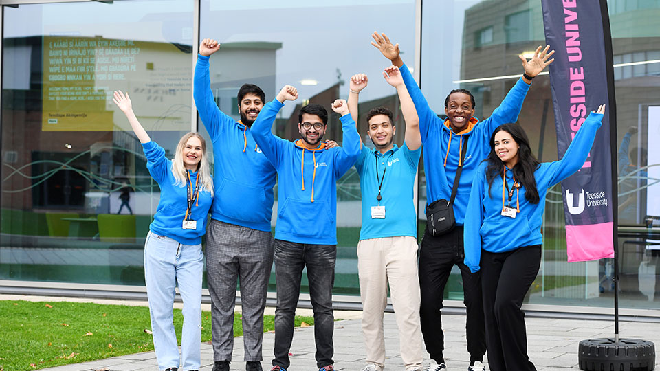 Group of Teesside University student ambassadors smiling as they prepare for a virtual event