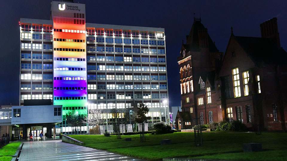 Middlesbrough Tower, Teesside University, illuminated in Disability Pride colours for Disability Pride Month