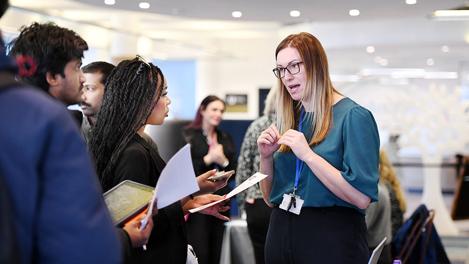 Teesside University staff member advising a student as part of graduate support services