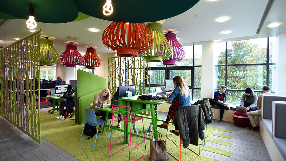 Students studying together in the Teesside University library