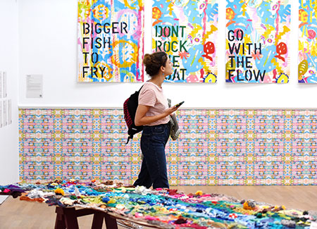 Visitor walking through a MIMA Gallery
