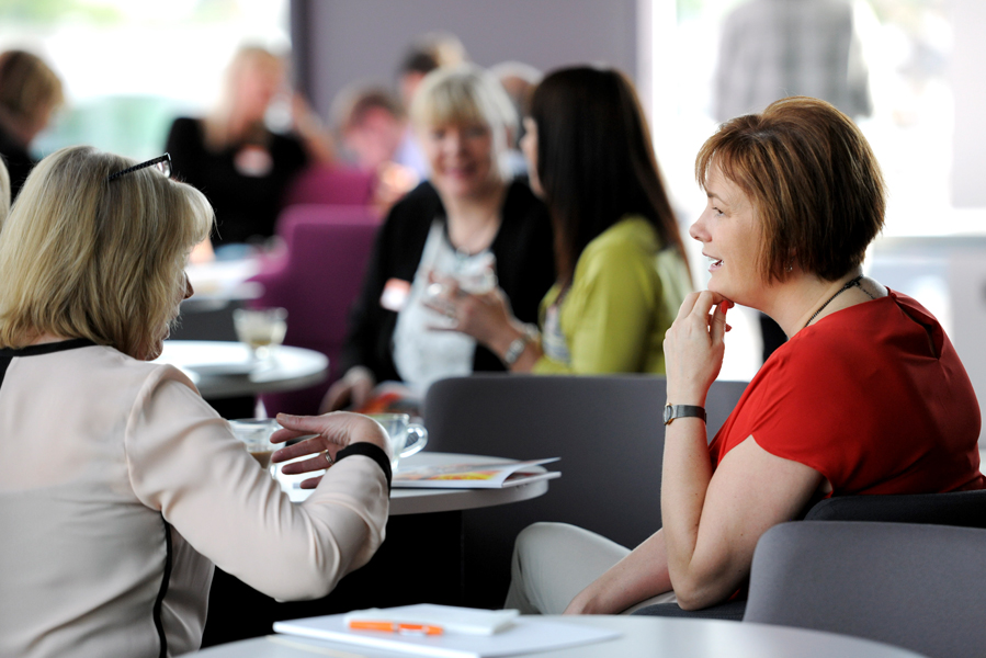 Some member of staff sitting talking