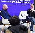 Marek Reichman in discussion at a lecture theatre