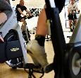 Students and staff participating in a spinning session at the gym at Teesside University