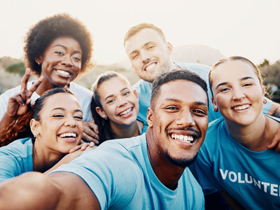 An image of smiling volunteers. Link to Do Good, Feel Good! Volunteering opportunities 8 & 15 July 2026.