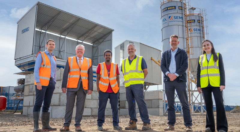 (L-R): Professor David Hughes, Bob Borthwick, Scott Bros’ Recycling Innovation Engineer Feysal Shifa, Peter Scott, Joss Newberry and Cassidy Smith, Teesside University’s IP and Commercialisation Manager, at the low-carbon concrete plant 