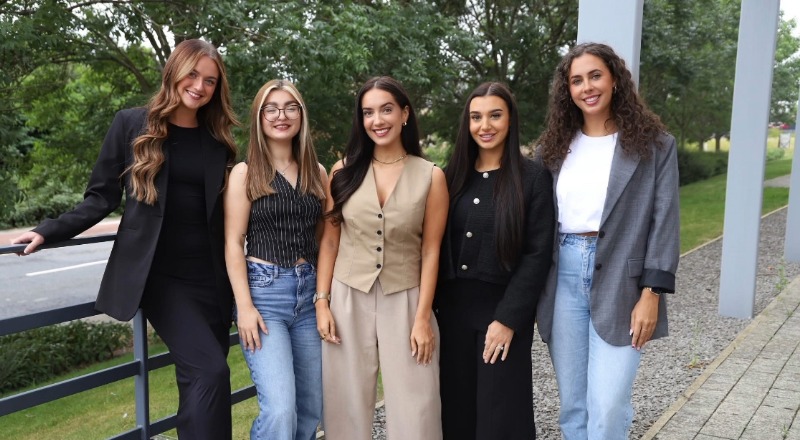 Sophia (centre) with the Petite Agency team