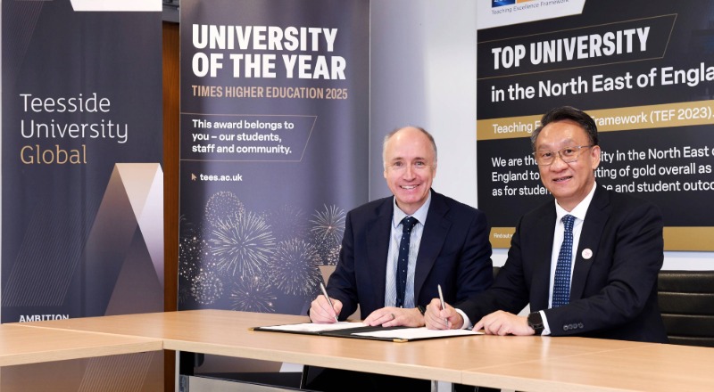 Dr Warren Harrison (left) and Jigang Yan (right)