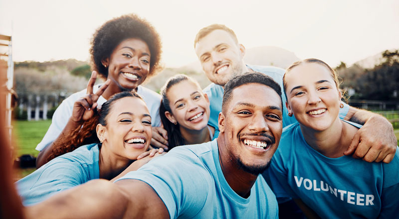 An image of smiling volunteers