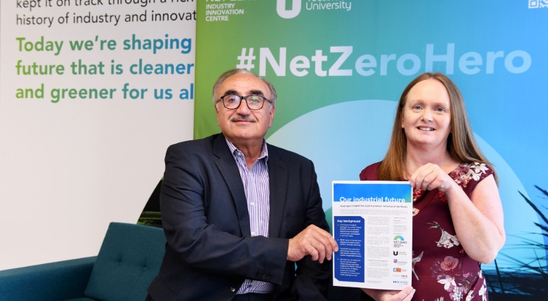 Professor Nashwan Dawood and Dr Clair Cooper with the paper
