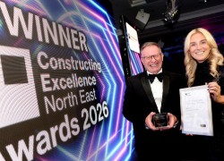    Darren Vipond, Director of Campus Services, receiving his Outstanding Contribution award from Nik Welsh, of believe housing and CENE chair 