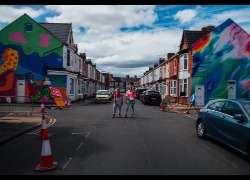 Artists Nocciola the Drawer (Hazel Oakes) and Hannah Campion with the murals