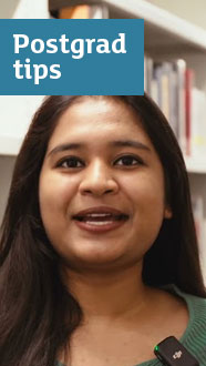 Postgrad tips to start your journey - a member of staff at an open day