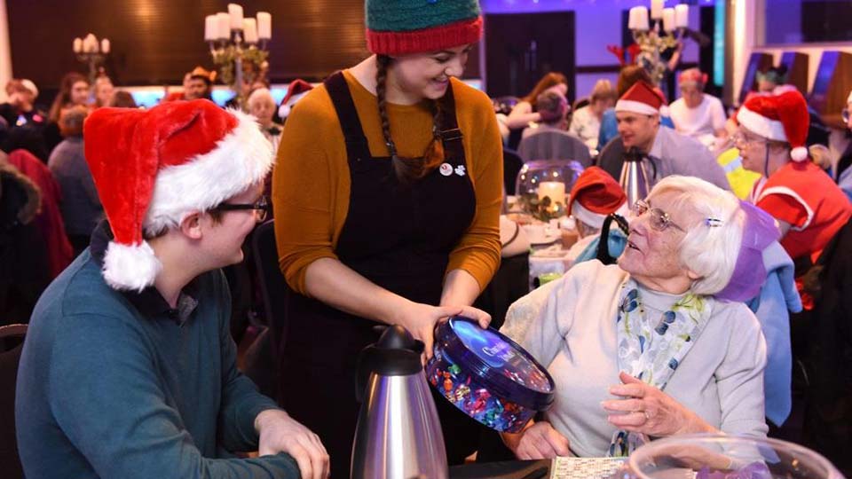 Voluntees Teesside University Christmas party for the elderly