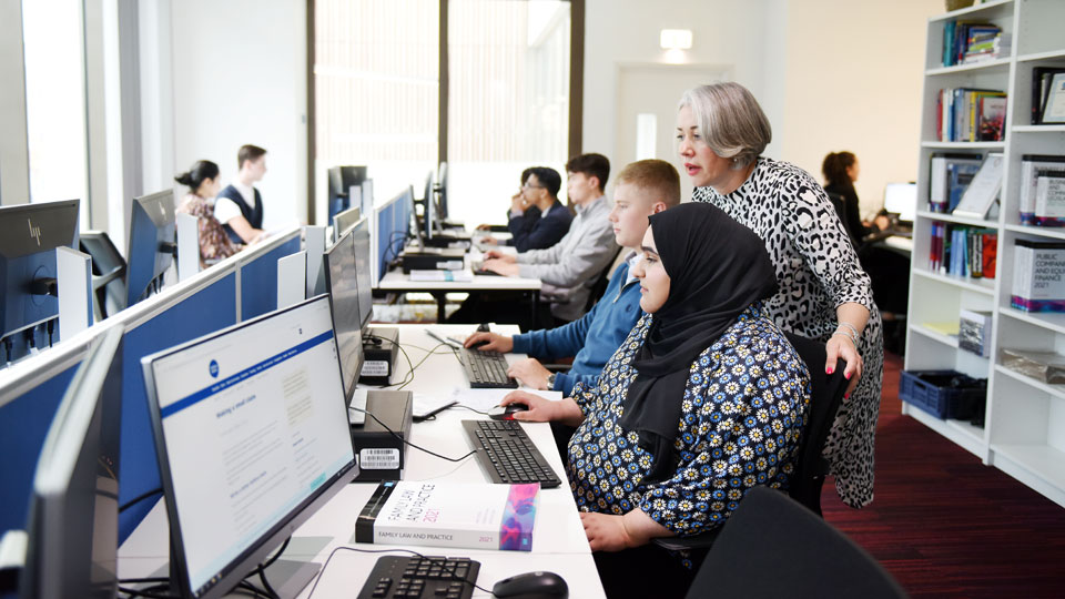 Students learning in the law clinic
