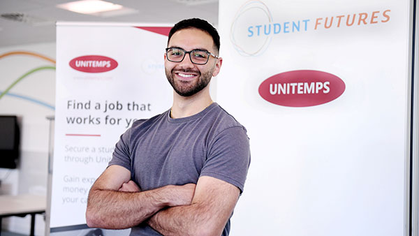 Student smiling after receiving a scholarship award