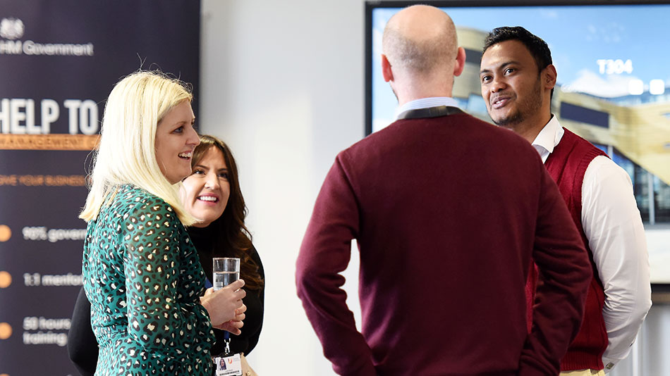 Staff discussion at TU Supporting Minority Ethnic Business Event