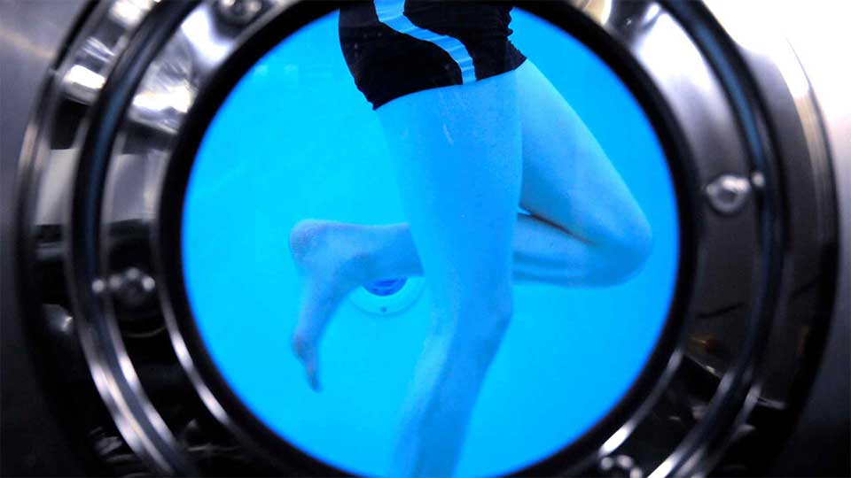 person in hydrotherapy pool