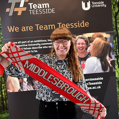 Dr Susy Cook holding a Middlesbrough FC scarf