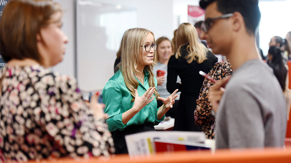 Students and companies in a careers fair