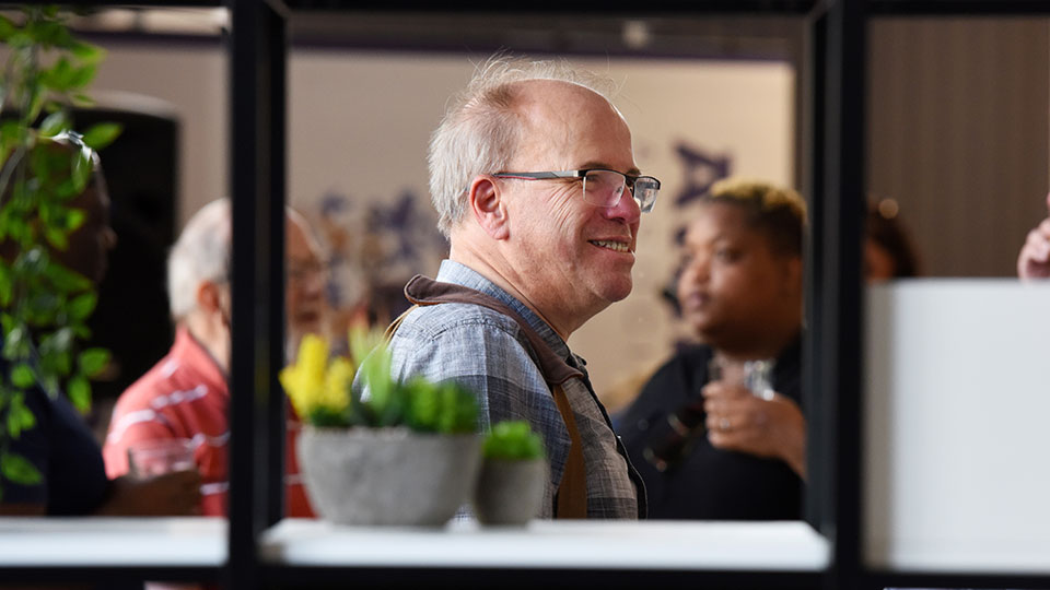 Staff speaking in an event