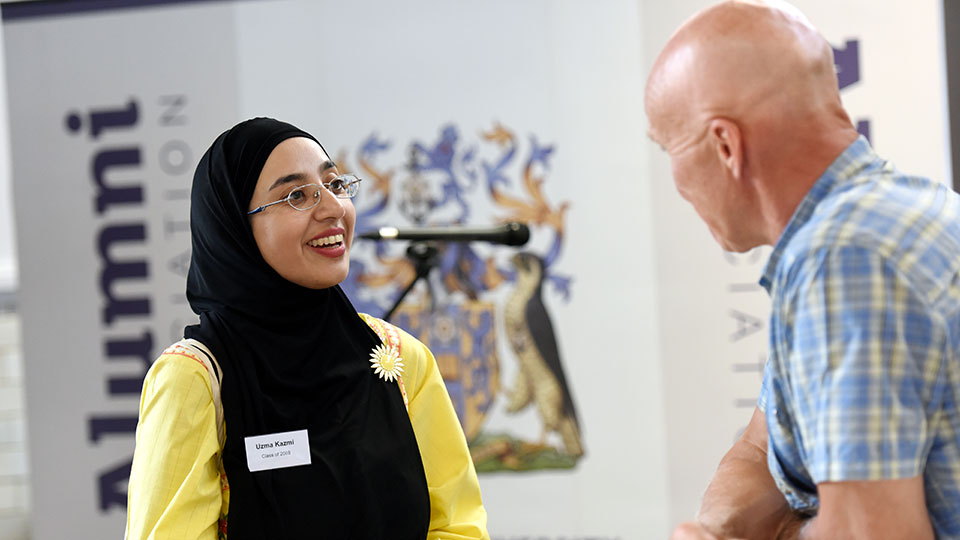 Staff speaking in an event