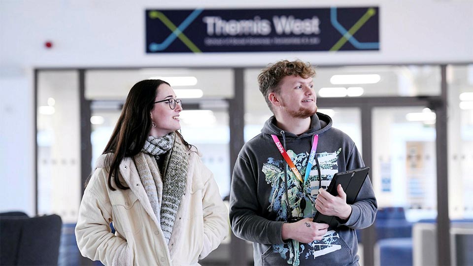 Students on campus walking