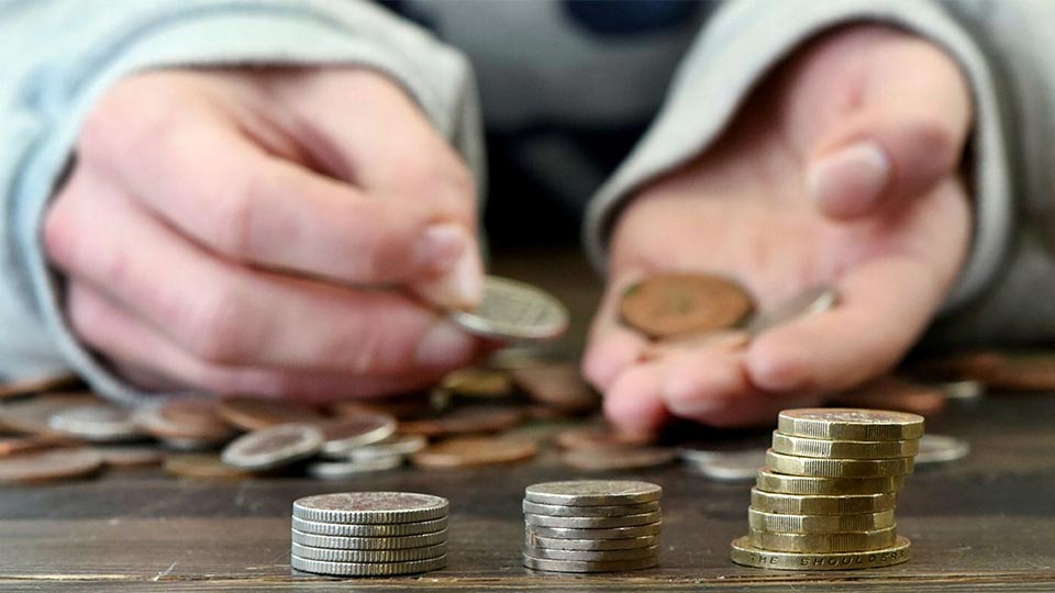 Student counting coins