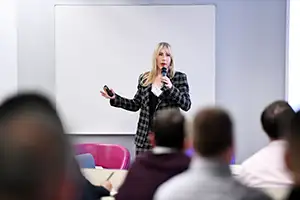 Teesside University staff member speaking at a business conference