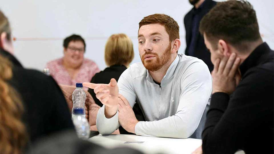 Students in a classroom. Link to Professional apprenticeships.