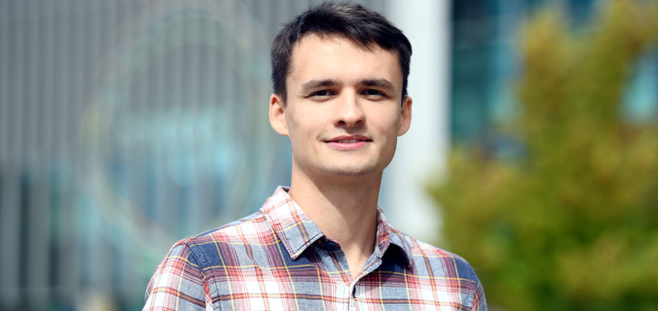 Students studying and sitting together in the library at Teesside University