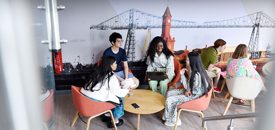 International students sitting and studying at Teesside UniversityK