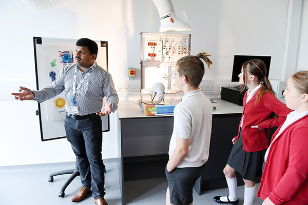 Students of Bewley Primary School at Net Zero Industry Innovation Centre with a Net Zero member of staff
