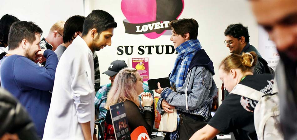 Awards dinner attenders sit in some round tables at Student Union