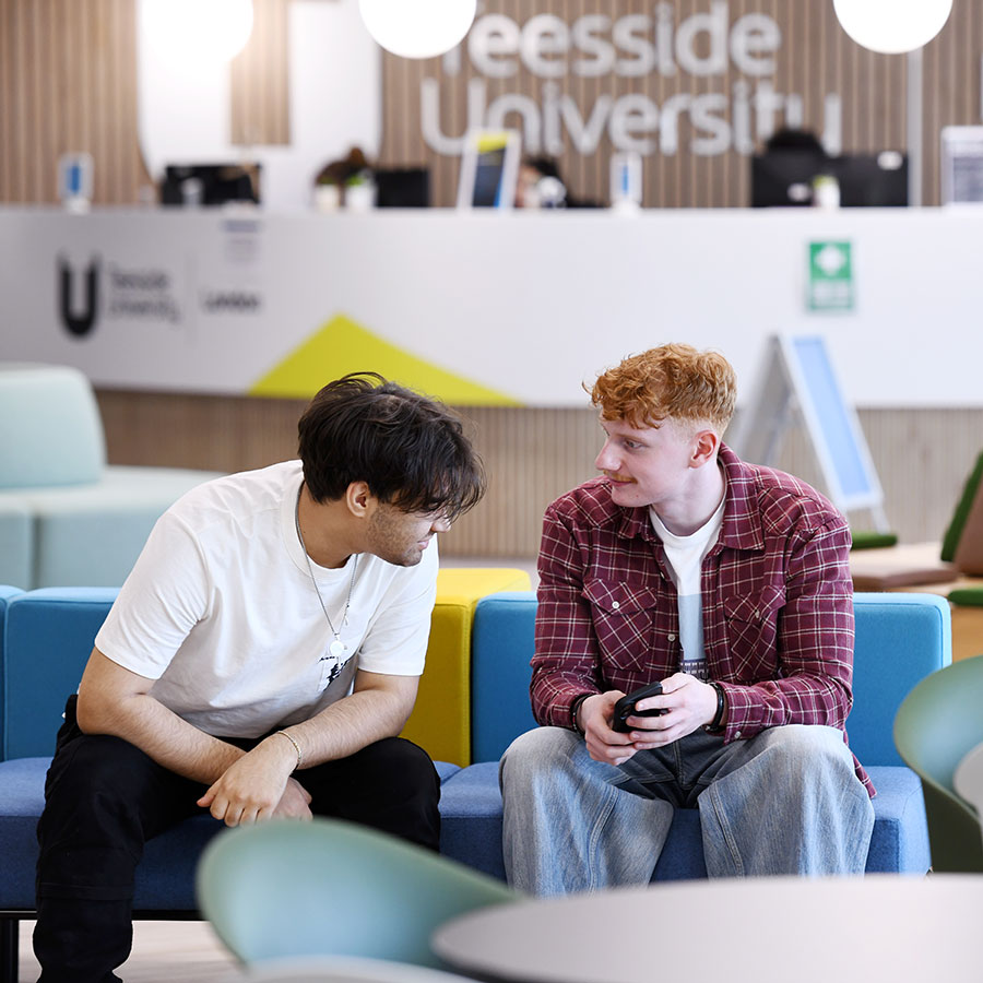 Students sit and talking at Teesside University London
