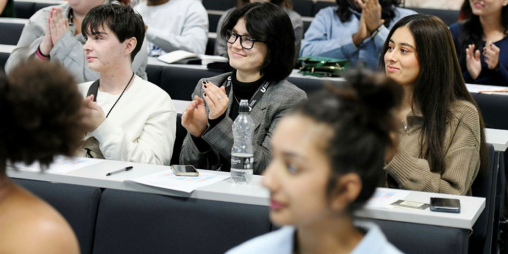 TU Prague City Study Centre students studying together with a tablet